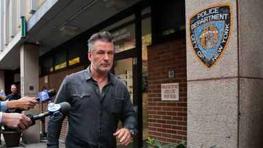 Actor Alec Baldwin walks out of the New York Police Department's 10th Precinct after he was arrested after allegedly punching a man in the face during a dispute over a parking spot outside his New York City home, authorities said.(Photo/Julie Jacobson)